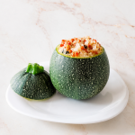 Round zucchini filled with quinoa and lentils
